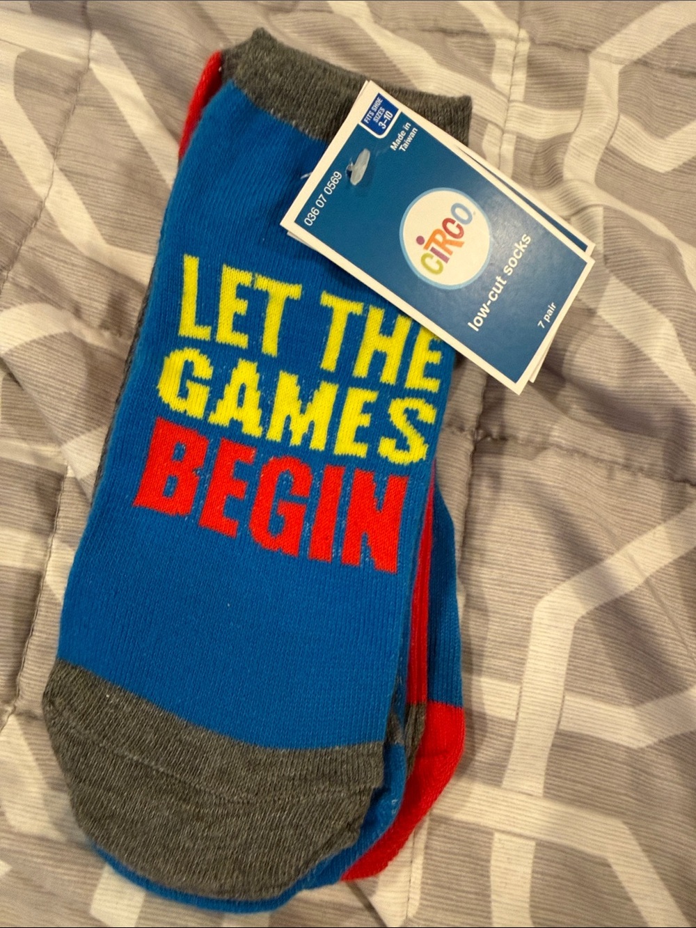 Circo blue low-cut socks with yellow and red text